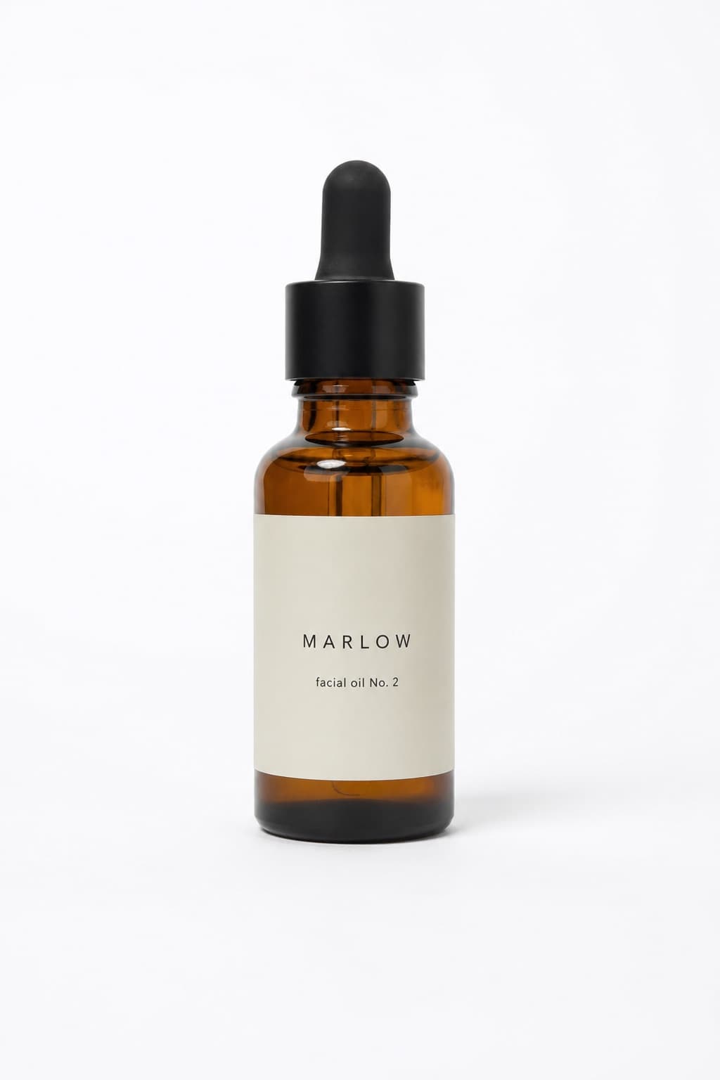 Uploaded reference photo: an amber glass serum bottle on a plain white background